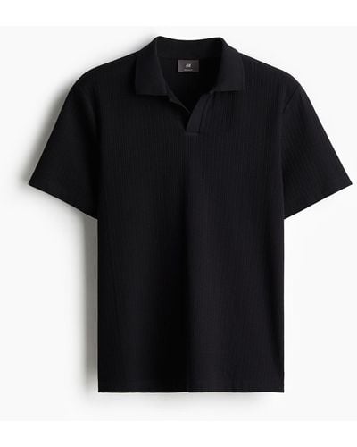 H&M Poloshirt mit Struktur in Regular Fit - Schwarz