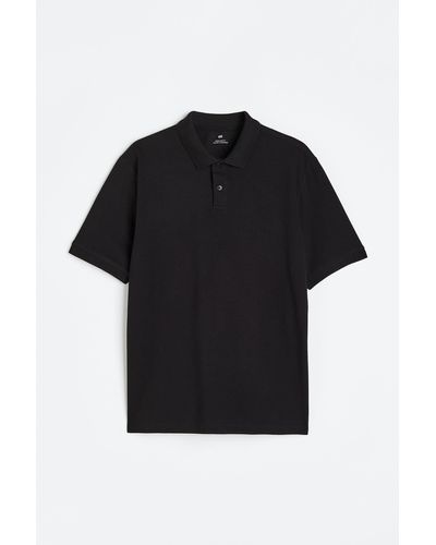 H&M Poloshirt aus Baumwolle Regular Fit - Schwarz