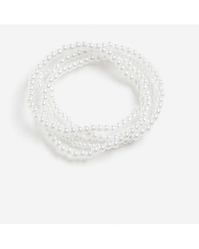 H&M 5er-Pack Perlenbesetzte Armbänder - Weiß