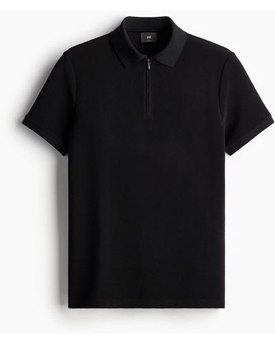 H&M Poloshirt mit Zipper in Slim Fit - Schwarz