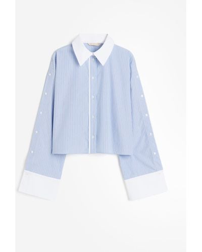H&M Cropped-Bluse mit Knopfdetails - Blau