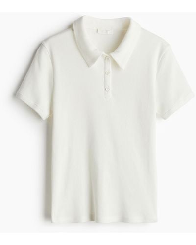 H&M Geripptes Poloshirt - Weiß
