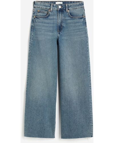 H&M Wide High Ankle Jeans - Bleu