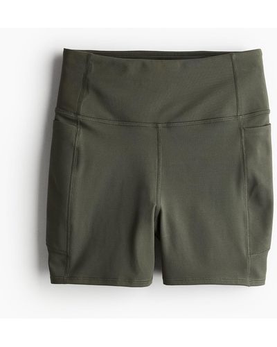 H&M DryMove Sport-Hotpants mit Taschendetails - Grün