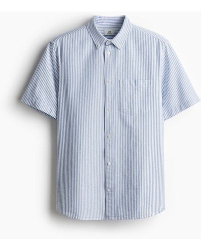 H&M Kurzärmeliges Oxford-Hemd in Regular Fit - Blau