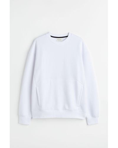 H&M Sport-Sweatshirt Relaxed Fit - Weiß