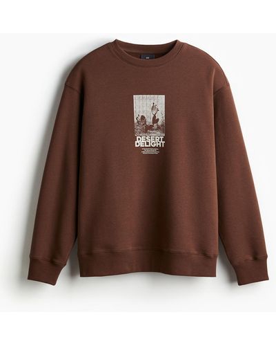 H&M Bedrucktes Sweatshirt in Loose Fit - Braun