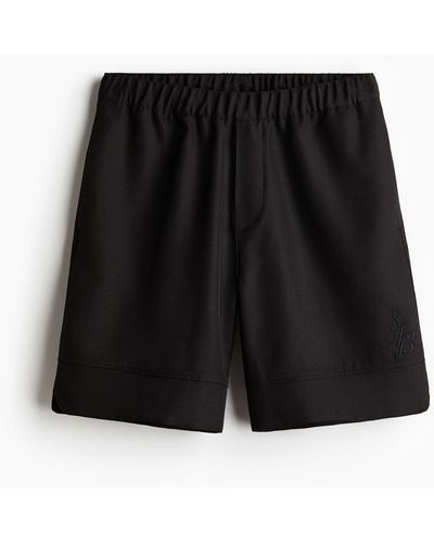 H&M Knielange Shorts in Relaxed Fit - Schwarz