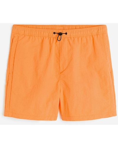 H&M Nylonshorts in Regular Fit - Orange