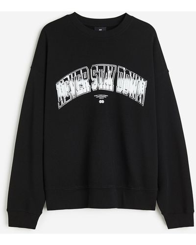 H&M Sweatshirt mit Print Relaxed Fit - Schwarz