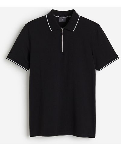 H&M Poloshirt mit Zipper in Slim Fit - Schwarz