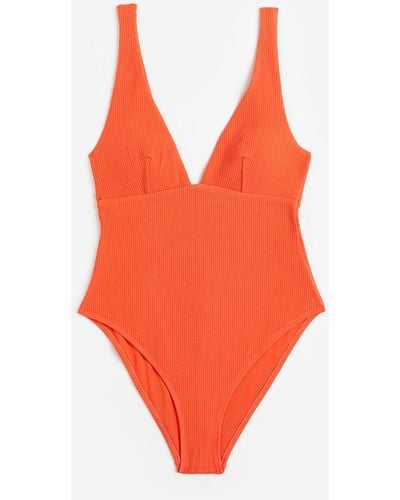 H&M Gerippter Badeanzug High Leg - Orange