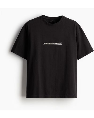 H&M Bedrucktes T-Shirt in Loose Fit - Schwarz