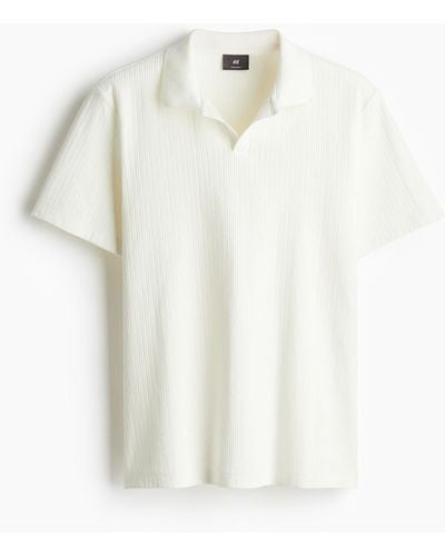 H&M Poloshirt mit Struktur in Regular Fit - Weiß