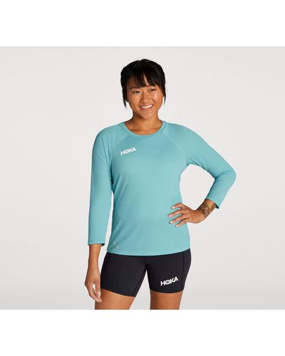 Hoka One One T-shirt à manches trois-quarts Glide pour Femme en Coastal Shade Taille L | T-Shirts À Manches Courtes - Bleu