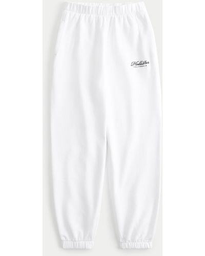 Hollister Co. STRAIGHT LEG VARSITY LOGO SWEATPANT - Tracksuit bottoms -  white update/white 