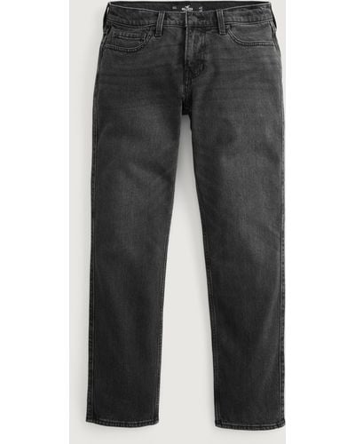 Hollister Markentypische Slim Straight Jeans in verblasstem Schwarz - Grau
