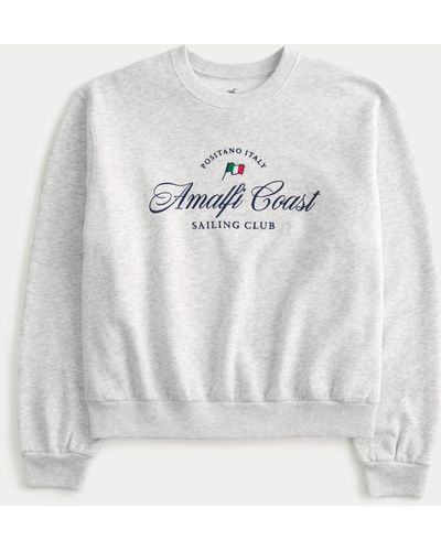 Hollister Lässiges Sweatshirt mit Rundhalsausschnitt und Amalfi Coast-Grafik - Weiß