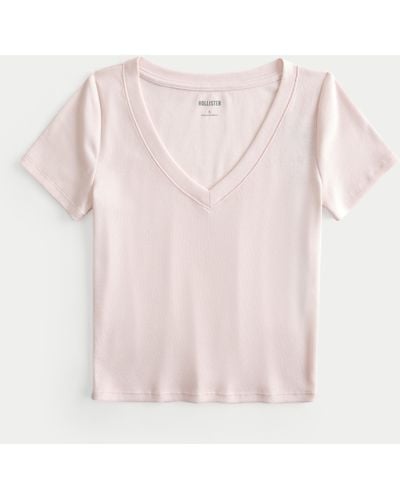 Hollister Geripptes T-Shirt mit V-Ausschnitt - Pink