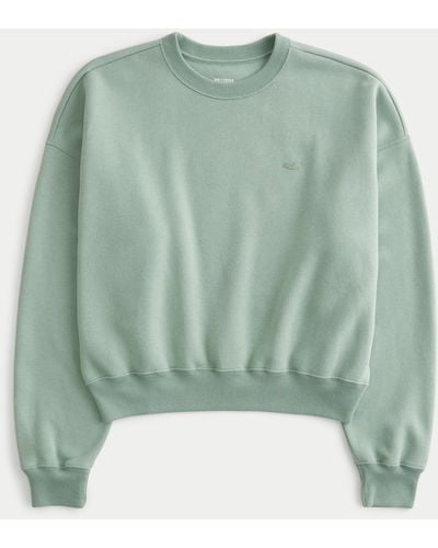 Hollister Lässiges Sweatshirt mit Rundhalsausschnitt und Symbol - Grün
