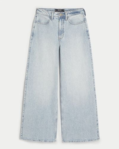 Hollister Ultra High Rise Jeans mit weitem Bein, helle Waschung - Blau