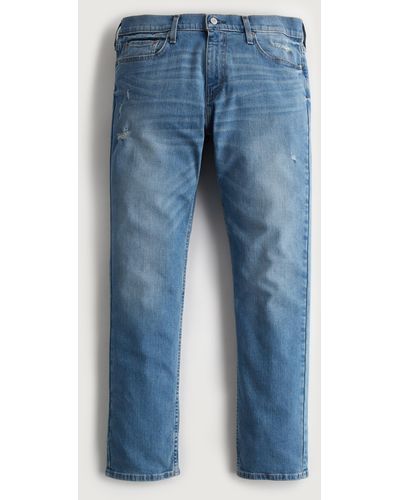 Hollister Slim Straight Jeans in mittlerer Waschung und Distressed-Optik - Blau