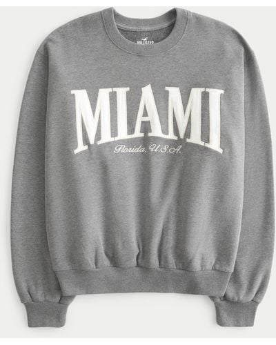 Hollister Lässiges Sweatshirt mit Miami Beach Florida-Grafik und Rundhalsausschnitt - Grau