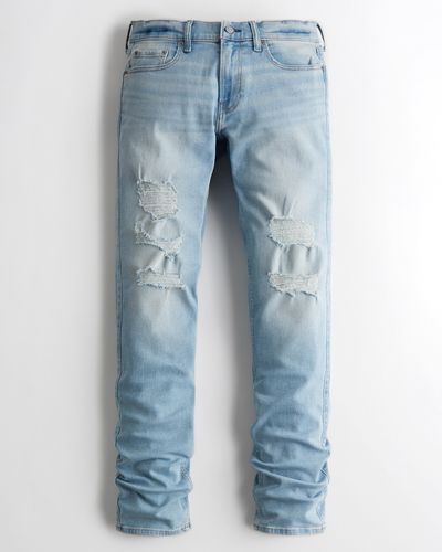 Hollister Stacked Slim Straight Jeans in heller Waschung mit Rissen - Blau