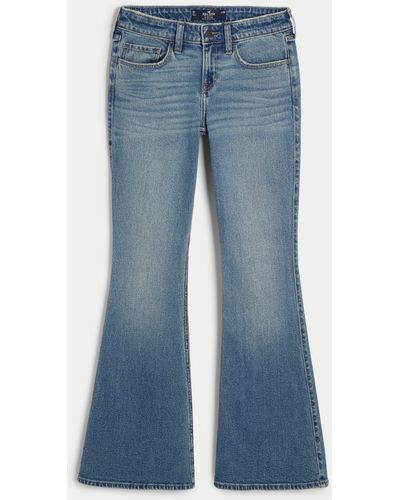 Hollister Low Rise Flare Jeans im Vintage-Stil, in mittlerer Waschung mit Musterdruck - Blau