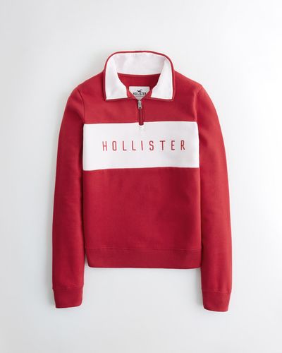 Hollister Lässiges Sweatshirt mit aufgestickter Logografik und kurzem Reißverschluss - Rot