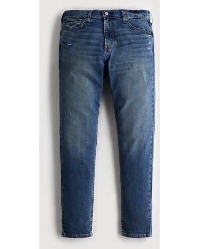 Hollister Athletic Skinny Jeans in dunkler Waschung und Distressed-Optik - Blau