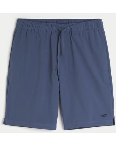 Hollister Hybrid Active Shorts mit Logo, 23 cm - Blau