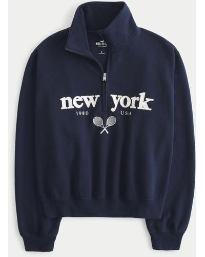 Hollister Lässiges Sweatshirt mit kurzem Reißverschluss und New-York-Grafik - Blau