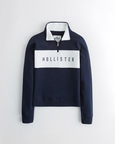 Hollister Lässiges Sweatshirt mit aufgestickter Logografik und kurzem Reißverschluss - Blau