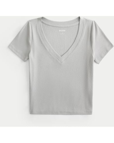 Hollister Geripptes T-Shirt mit V-Ausschnitt - Grau
