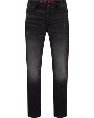 HUGO Schwarze Tapered-Fit Jeans aus bequemem Stretch-Denim - Blau