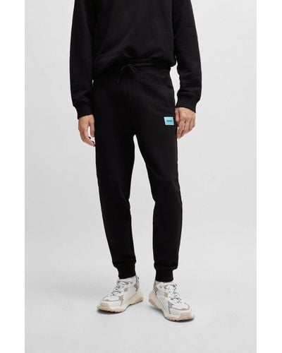 HUGO Cotton-terry Tracksuit Bottoms With Red Logo Label - Black