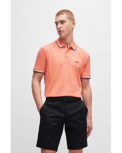BOSS Polo en piqué de coton avec logo contrastant - Orange