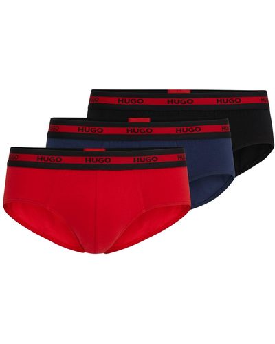 HUGO Paquete de tres calzoncillos slip en algodón elástico con logos en la cintura - Rojo