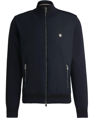 BOSS Jacke aus verschiedenen Materialien mit Reißverschluss und doppeltem Monogramm-Aufnäher - Blau