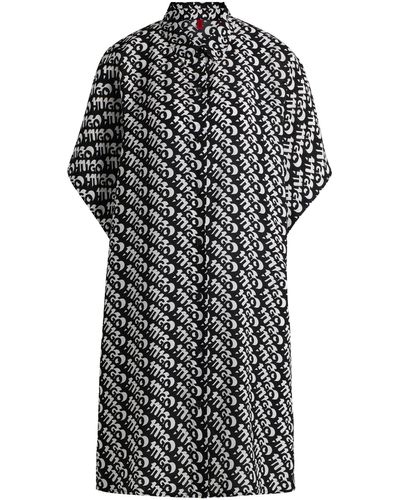 HUGO Vestito per il mare a maniche corte con logo stampato all-over - Nero