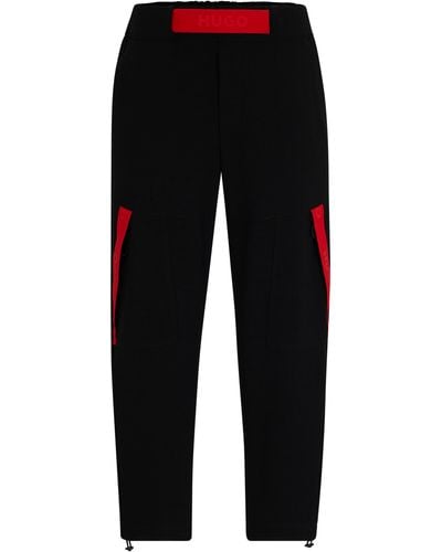 HUGO Relaxed-fit Trainingsbroek Met Rode Logoband - Zwart