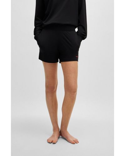 HUGO Shorts relaxed fit con logo de silicona estampado - Negro