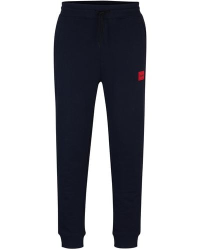 HUGO Jogginghose aus Baumwolle mit rotem Logo-Patch - Blau