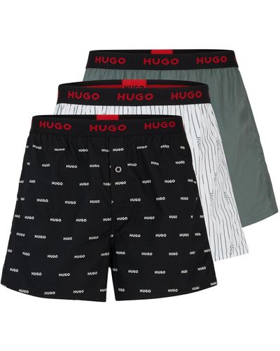 HUGO Paquete de tres calzoncillos bóxer de algodón con logos en la cintura - Negro