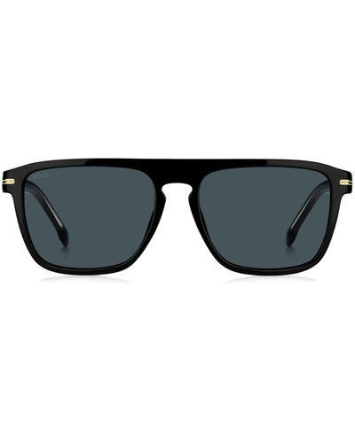 BOSS Sonnenbrille aus schwarzem Acetat mit goldfarbenen Details