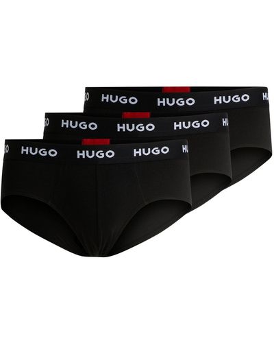 HUGO Paquete de tres calzoncillos slip en algodón elástico con logos en la cintura - Negro