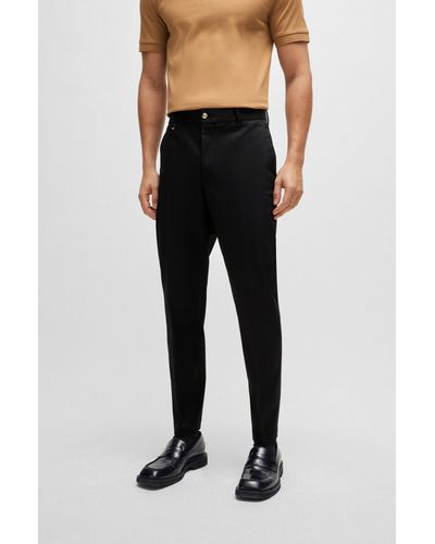 BOSS Pantalon Relaxed Fit boutonné en coton stretch - Noir