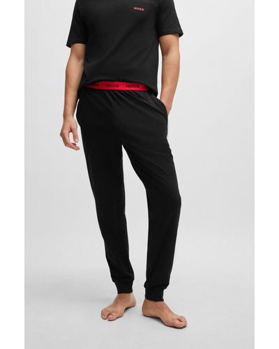 HUGO Pantalones de pijama de algodón elástico con logos en la cintura - Negro