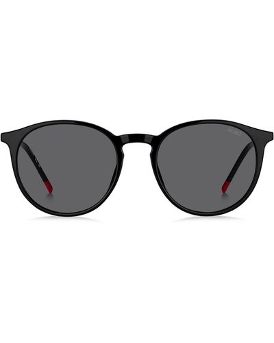 HUGO Zwarte Zonnebril Met Kenmerkende Uiteinden